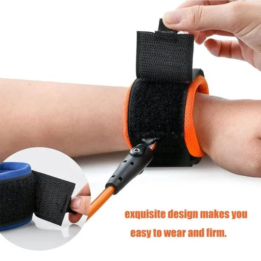 Person wearing an orange and black wrist support device with text on a white background
