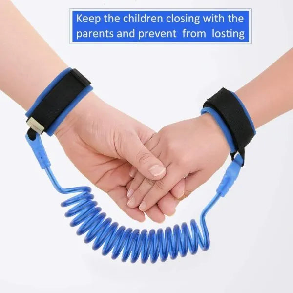 Two hands holding a blue child leash with text on a white background