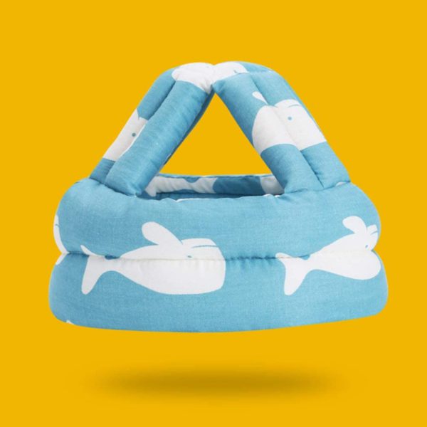 Blue inflatable pool float with white dolphin design on a yellow background