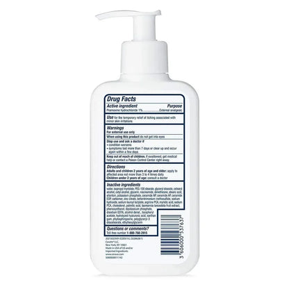 White bottle with a pump and label on a white background