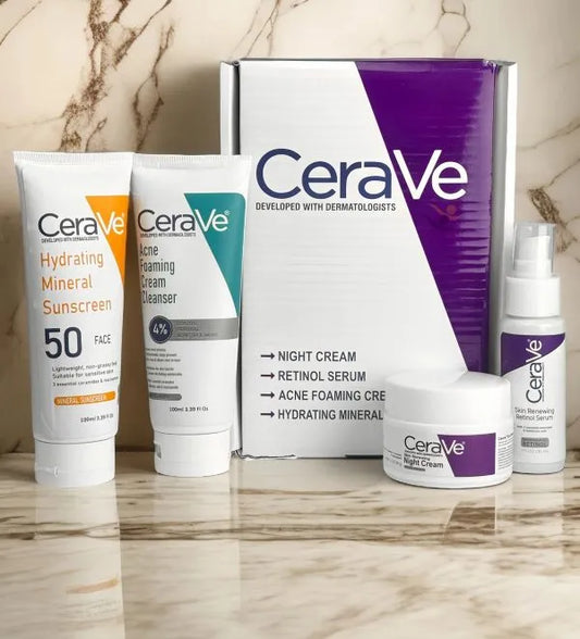 CeraVe skincare products including cream, cleanser, and sunscreen on a marble surface.