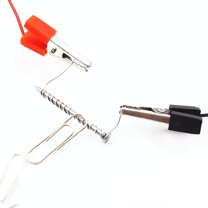 Electrode holder with red clip and black base on a white background