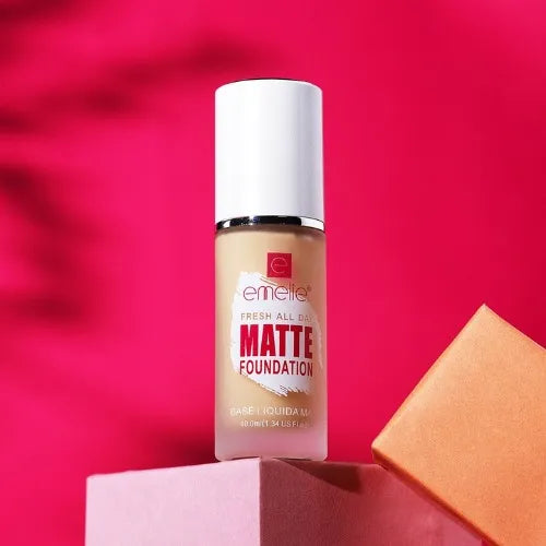 Emelie Matte Foundation bottle on a pink background