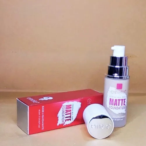 Carmabel matte foundation bottle and packaging on a beige surface