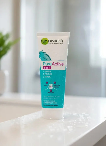 Garnier Pure Active 3-in-1 skincare product on a white surface with a blurred background