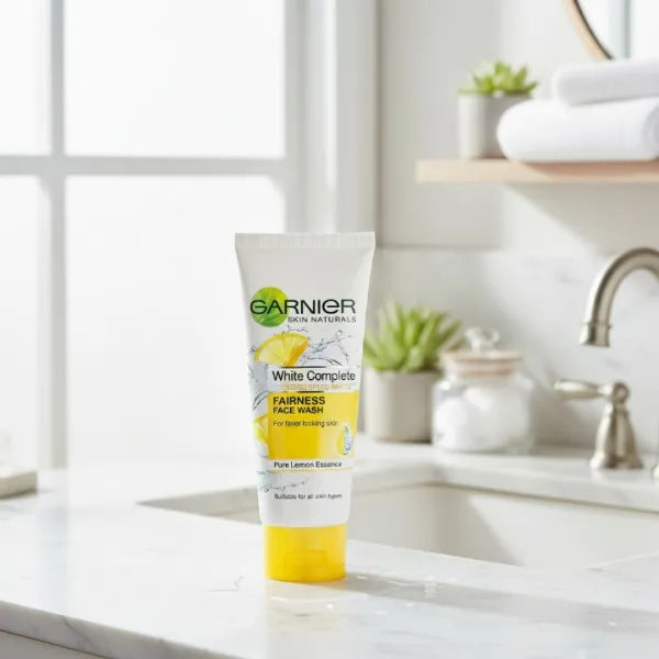 Garnier White Complete Fairness Face Wash tube on a bathroom counter