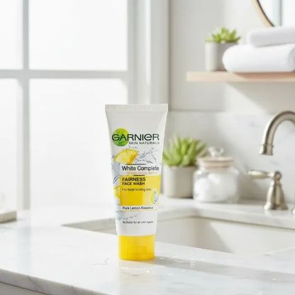 Garnier White Complete Fairness Face Wash tube on a bathroom counter