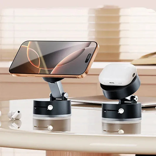 Phone and wireless earbuds on a charging stand with a blurred background