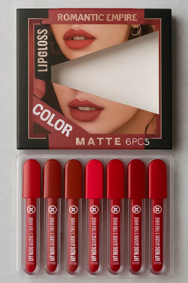 Set of red lip glosses in a packaging with 'Romantic Empire' branding.