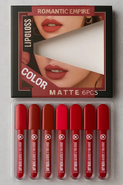 Set of red lip glosses in a packaging with 'Romantic Empire' branding.
