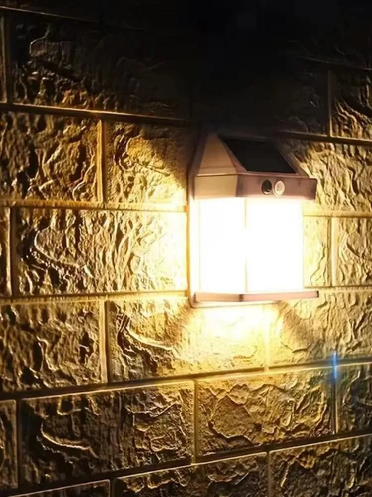 Solar light fixture on a textured stone wall