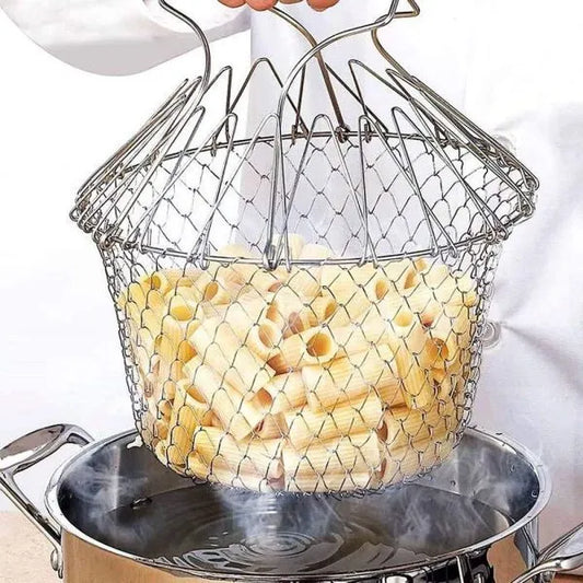 Metal mesh strainer filled with cooked pasta over a pot of boiling water.